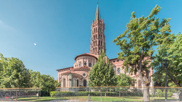 The cobbled parvis of the Basilica of Saint Sernin in Toulouse, France, timelapse hyperlapse.
