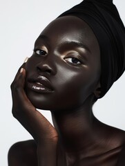 Beautiful Black Woman with Hand on Chin Against White Background Portrait Photography