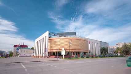 Obraz premium The building of Kazakh Drama Theatre in Uralsk timelapse hyperlapse.