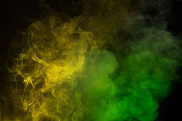 Green and white steam on a black background.