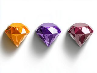 Trois diamants colorés sur fond blanc