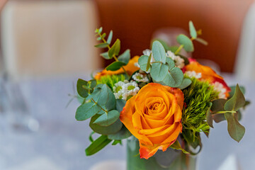Beautiful fresh flowers table decoration in a restaurant for a special event