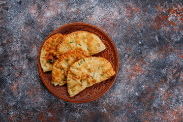 Traditional Russian deep fried meat pies - chebureki.