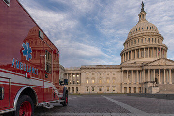 Capitol building and emergency ambulance vehicles