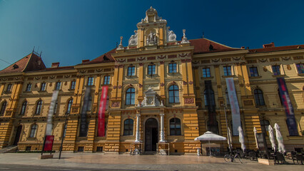 Fototapeta premium A view of the Museum of Arts and Crafts timelapse hyperlapse in Zagreb during the day. Croatia