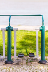 Public exercise machine in a park designed for outdoor fitness.