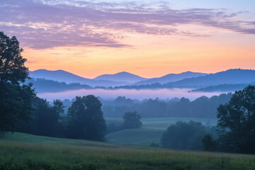 Obraz premium Fog filling valleys of blue ridge mountains at sunrise