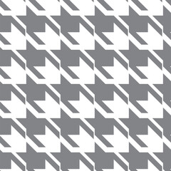 Geometric black and white seamless pattern with pied-de-poule ornament. Monochrome graphic repeating design. Modern minimalist stylish squared background. Vector chequered motif for fabric, textile.