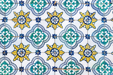 Close-up of traditional azulejo tiles on a historic facade in downtown Lisbon