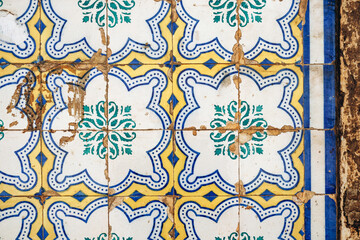 Close-up of traditional azulejo tiles on a historic facade in downtown Lisbon