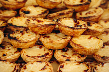 Traditional Portuguese dessert pasteis de nata, served fresh in Lisbon