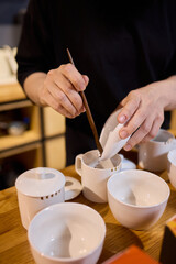 Tea Preparation with Traditional Utensils blends culture and comfort, enhancing aesthetics