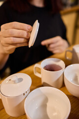 Tea Preparation with Traditional Utensils blends culture and comfort, enhancing aesthetics