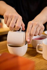Tea Preparation with Traditional Utensils blends culture and comfort, enhancing aesthetics