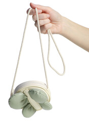 Kids purse bag with butterfly in hand on white background isolation