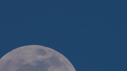 Almost Full Moon During the Day Time Lapse