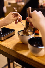 Experience a Delicious Bowl of Comforting Soup at a Cozy Restaurant with a Relaxing Setting