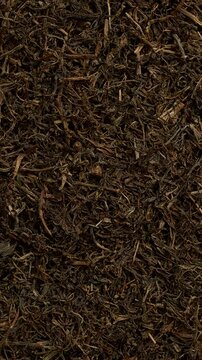 Dried Faran herb background texture - herb belonging to the onion family, used extensively in Nepal and in some Himalayan states of India. Table spin. Vertical video.