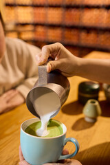 How to Prepare a Creamy Artisan Matcha Latte with Milk Frothing for Your Enjoyment