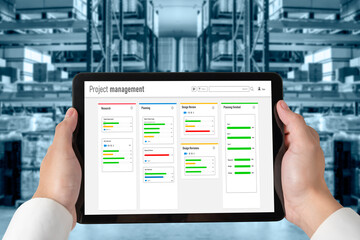 Project planning software for modish business project management on the computer screen showing timeline chart of the team project