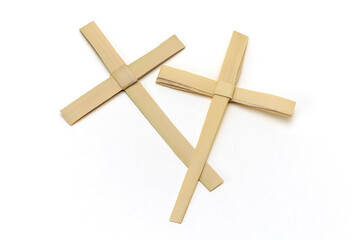 Palm Cross Isolated on White Background: Palm Sunday Symbol of Christian Faith in Forgiveness of since and Christ's Passion