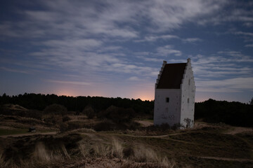 church at sunset in the sand
