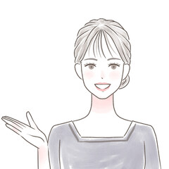 ユニフォームを着て案内をするクリニックの受付の女