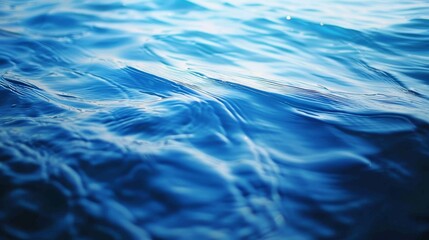 Vibrant blue water surface in a closeup view with clean lines and natural light