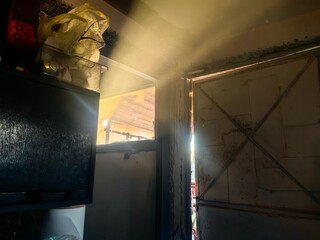 Sun rays through window in old construction - cottage  © Milje Ivan