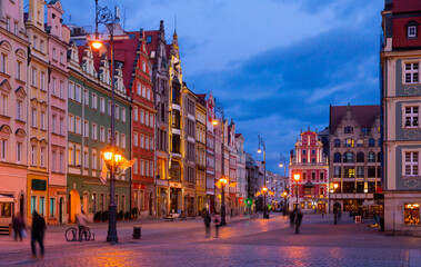 Scenic view of central Market Square of Wroclaw with traditional tenements at dusk