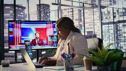 African american woman in a powerful role oversees budget analysis and investment strategy, showcasing her commitment to financial success and organizational growth. Work ethic. Camera B.
