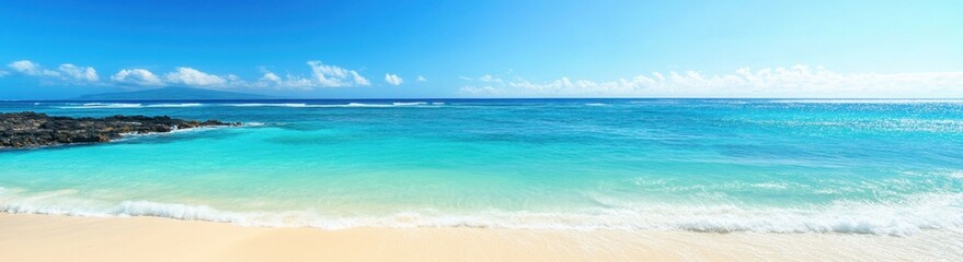 Obraz premium Breathtaking tropical beach with turquoise water and white sand meeting volcanic rocks