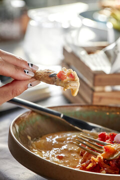 Bread bite with sauce.