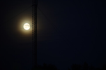 Moonlit Night with Radio Tower Silhouette