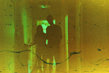 Couple is standing in the hallway