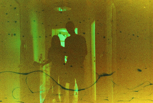 Couple is standing in the hallway