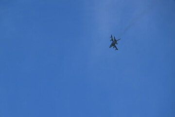 Military Aircraft Flying in Blue Sky