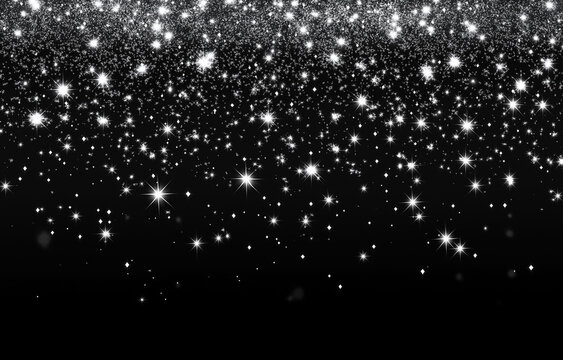 A shimmering silver glitter texture background with a highly shiny and sparkling appearance, creating a radiant and dazzling effect