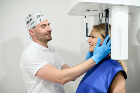 woman doing teeth roentgen at light medical clinic
