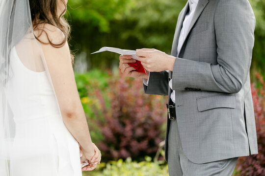 Closeup of Groom Reciting Vows to Bride during Ceremony