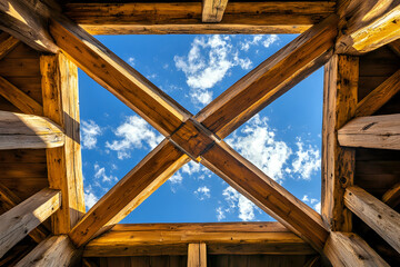 roof truss connection point, multiple beams converging, structural integrity visible in design