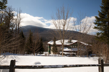 Snow covered landscape on a sunny day with  mountain views in nature 