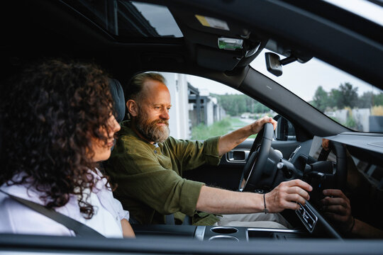 A man and a woman in a car