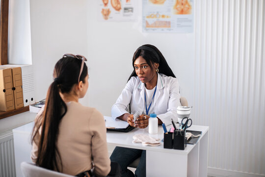 A woman at a consultation with a gynecologist in a private clinic.