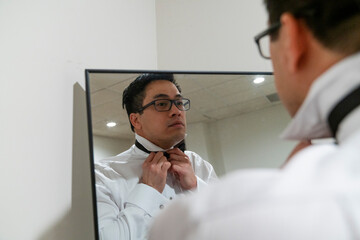 Groom getting ready for wedding