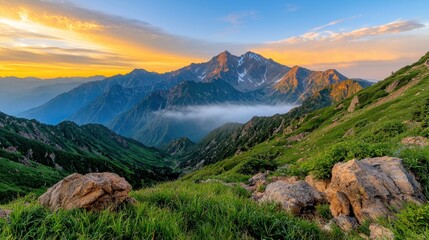 The majestic mountain landscape at dawn is enveloped in a ethereal mist, with shades of blue permeating the sky and painting a serene atmosphere that captivates the senses