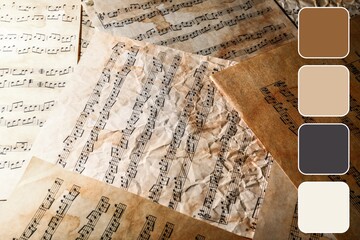Old music sheets, closeup. Different color patterns