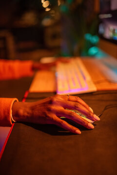 Woman using computer mouse