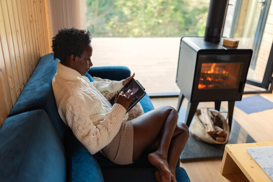 Woman browsing social media at home