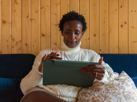 Smiling woman using tablet